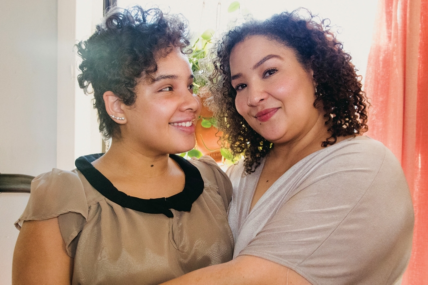Two women hugging